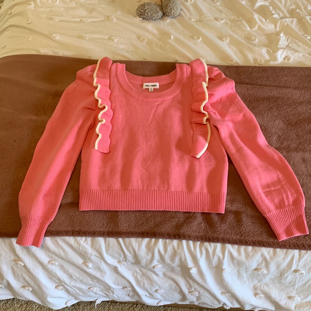 Day + Moon pink sweater with white accent ruffles